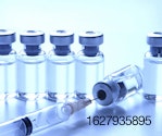 vaccine-vials-with-syringe.jpg