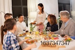 family-sitting-around-table-eating-2.jpg