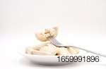 cooked-chicken-fork-plate-white background.jpg