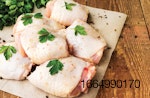 raw-chicken-thighs-on-parchment