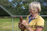 woman-holding-chicken